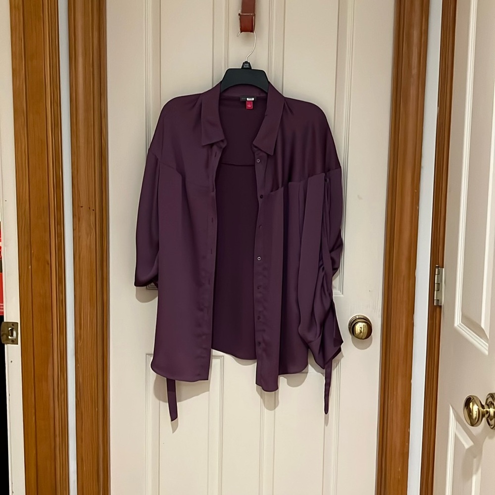 Beautiful purple/plum dress silky blouse. Buttoned down.